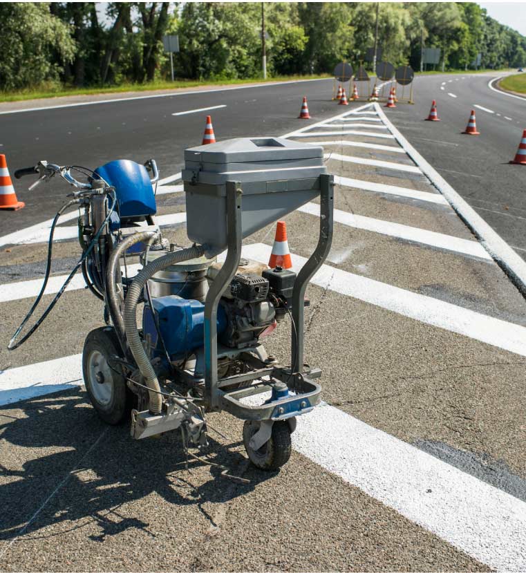 striping machine after a completed striping asphalt paving